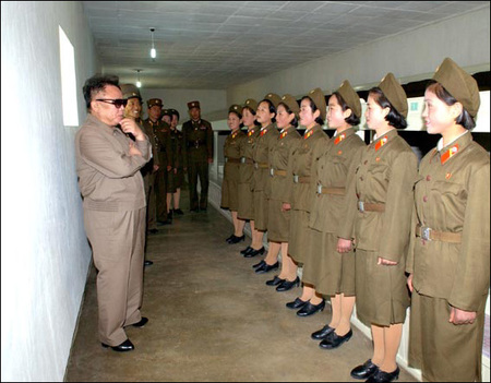 north korean women marching. dress code for all women: